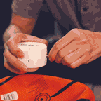 DR. SAVE DUO inflating a basketball with the ball needle
